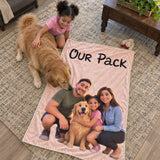 Golden retriever sniffing the personalized 3D family blanket that says Our Pack