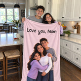 Kids surprising their mom with a personalized 3D blanket that says Love you, Mom